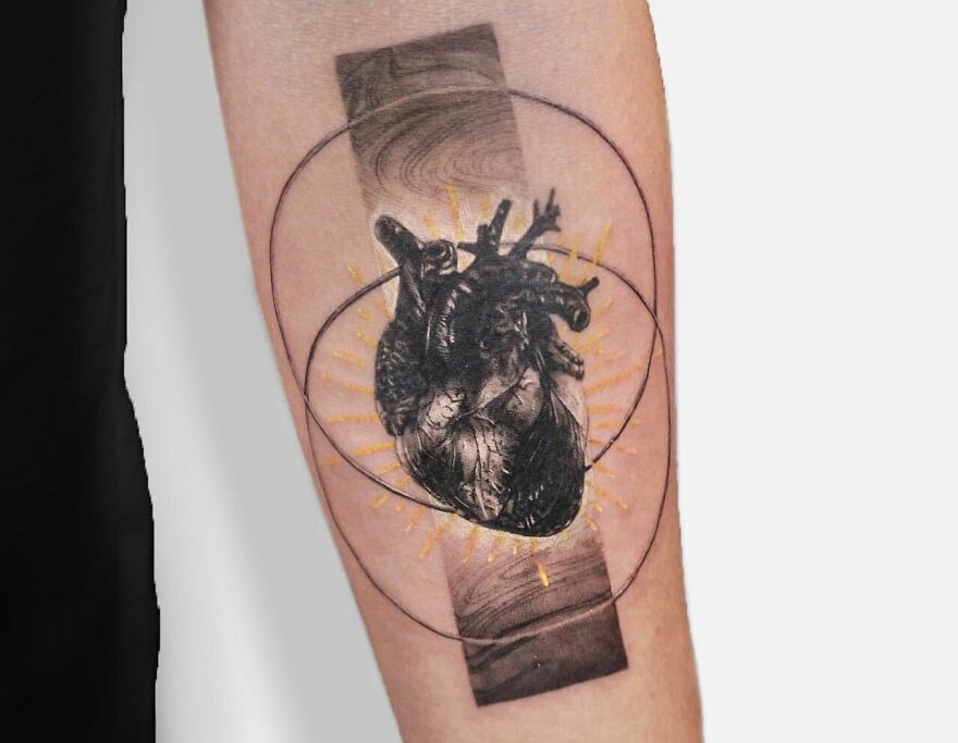 Heart and geometry forearm tattoo