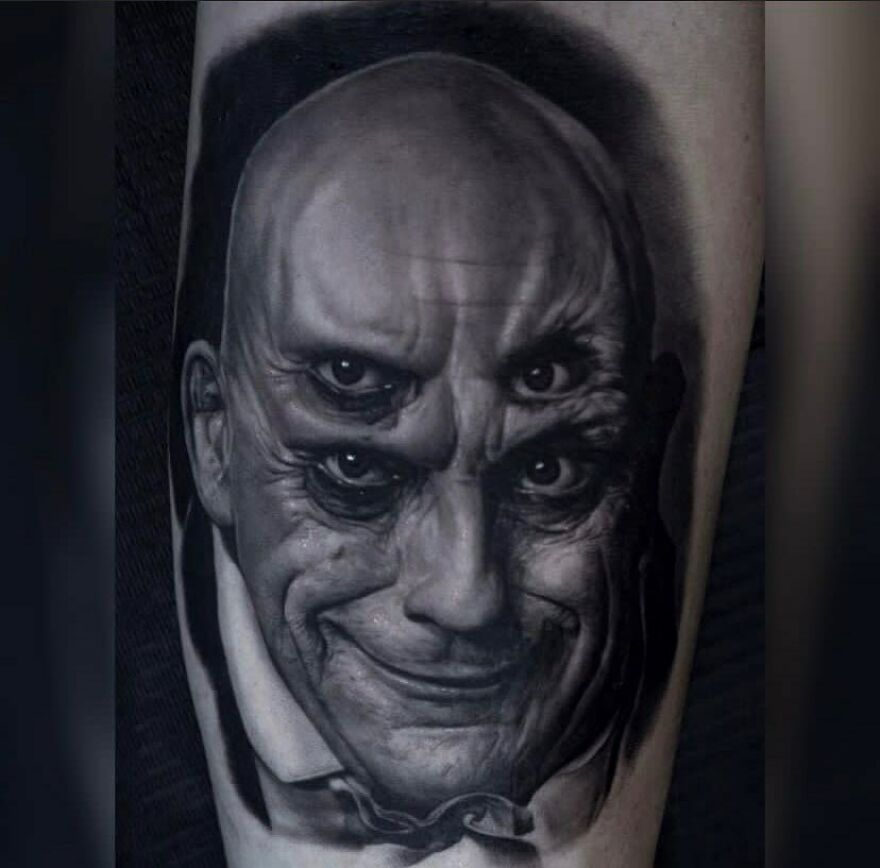 Uncle Fester with four eyes tattoo