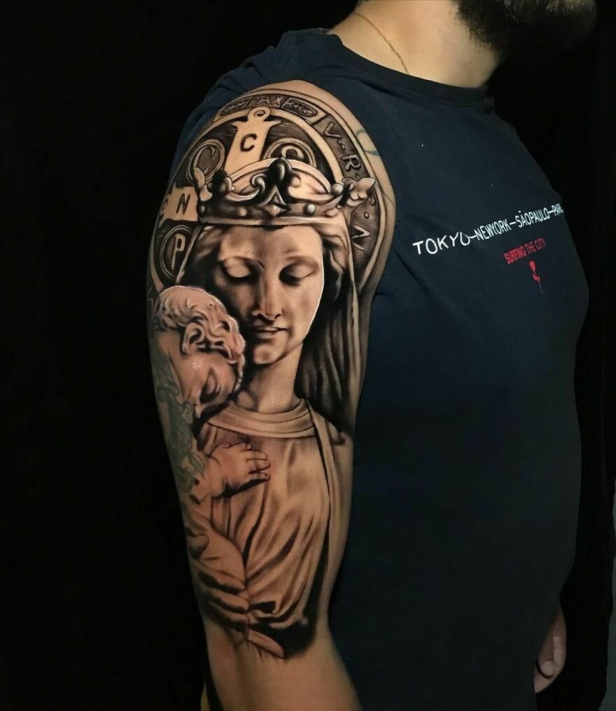 Nossa Senhora arm tattoo with super realistic detailing.