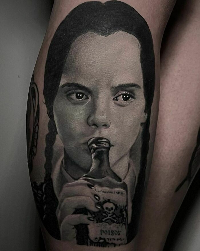 A realistic tattoo depicting a girl with braided hair holding a poison bottle.