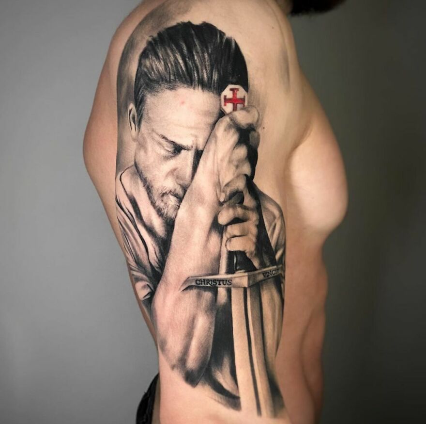 Last Templar theme tattoo with a man holding a sword