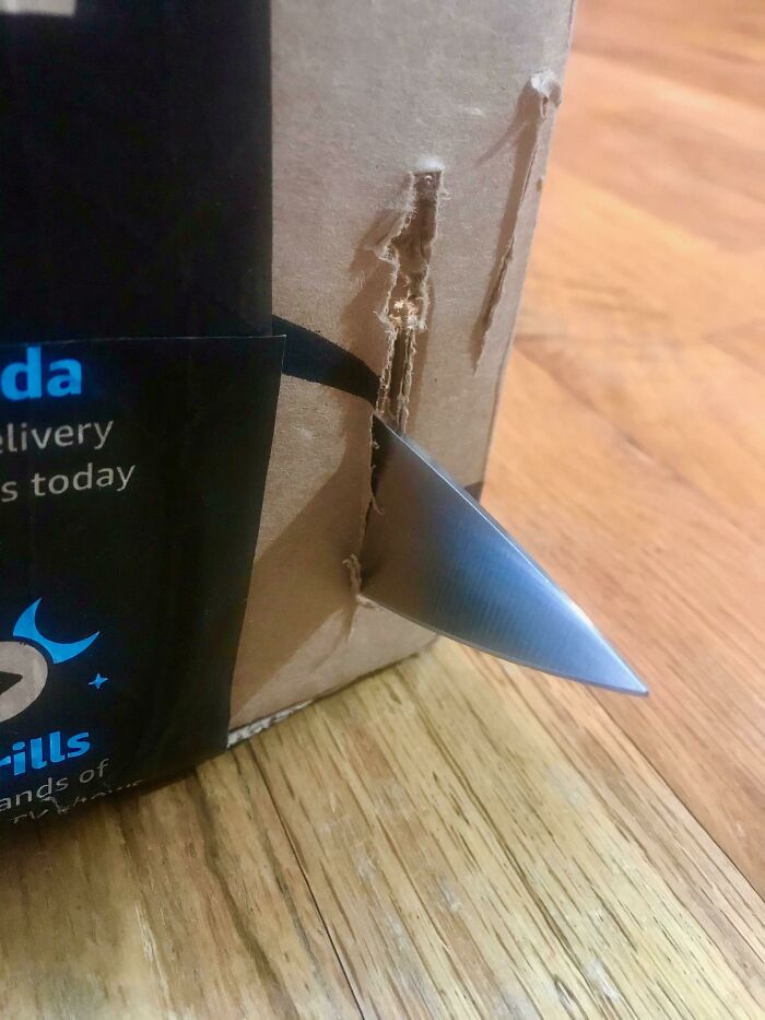 Removed The Safety Sheath, Tip Guard, And Tie Down And Then Poked An 8” Wüsthof Chef’s Knife Through My Amazon Box For This Picture