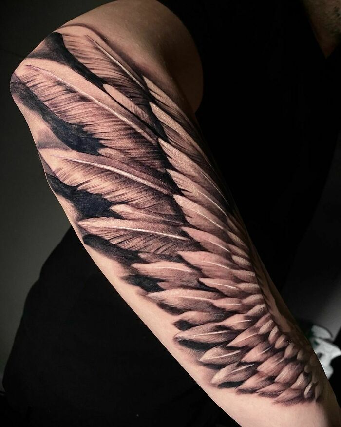 Hand Wing Tattoo