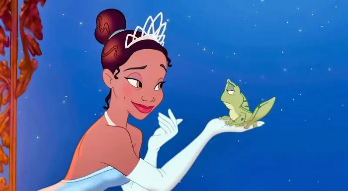 Tiana holding a frog 