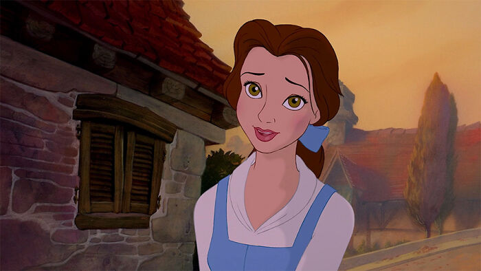 Belle wearing blue dress and bow 