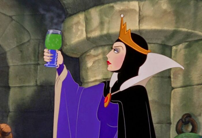 The Evil Queen holding a potions 