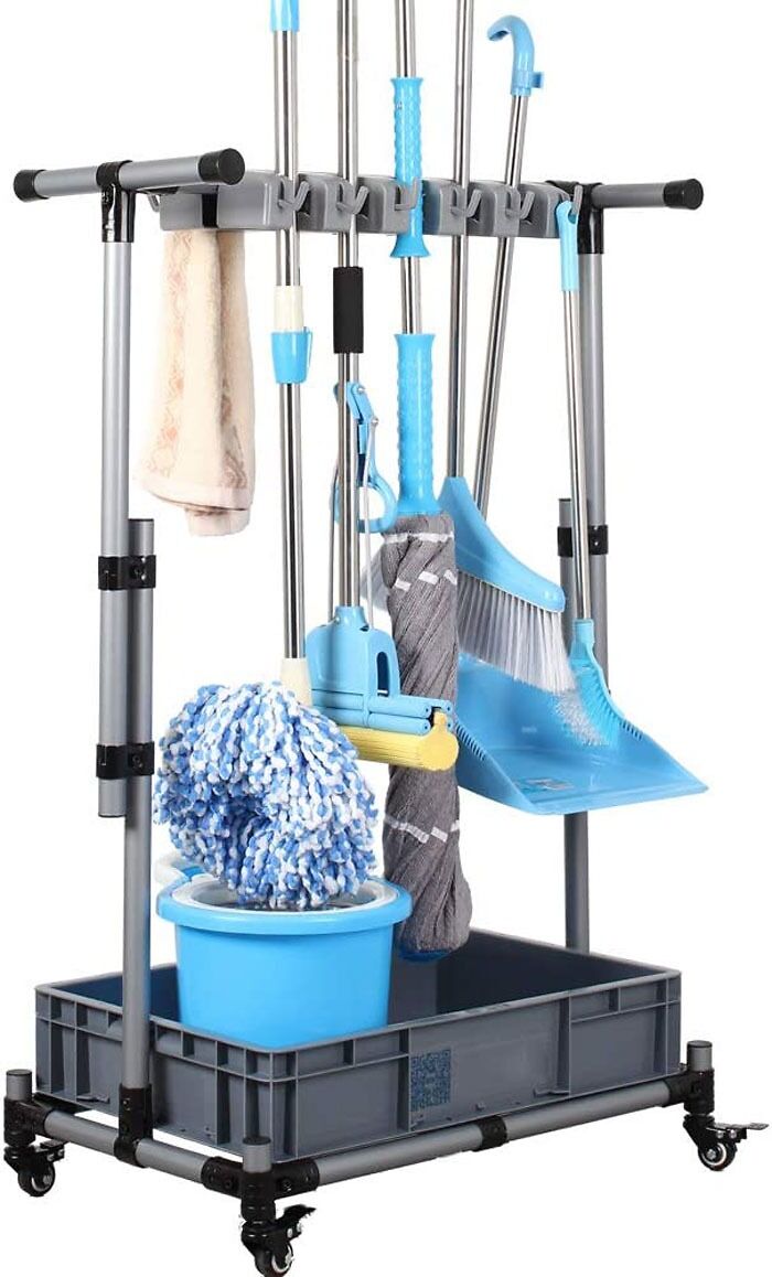 Cleaning tools organized on a mobile storage cart for home organization.