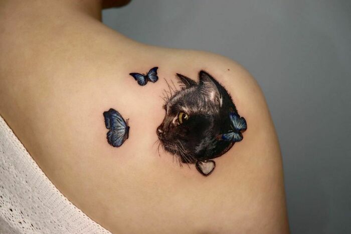 Permanent Memorial To Her Cat And Her Favourite Butterflies