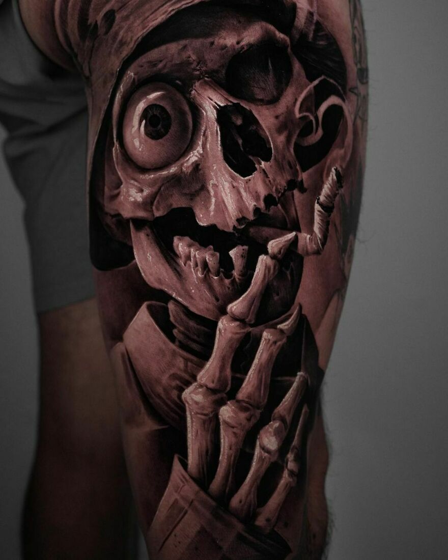 Realistic tattoo of a skeleton smoking a cigarette, showcasing intricate detailing.