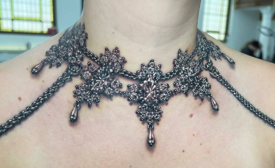Realistic full 360 wraparound metallic choker tattoo on neck
