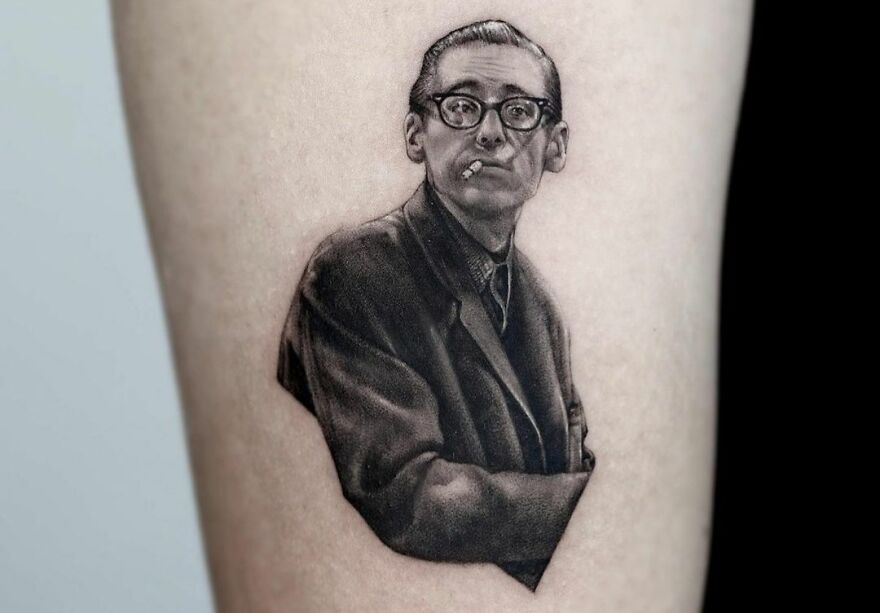 Realistic Bill Evans with cigarette in his mouth tattoo