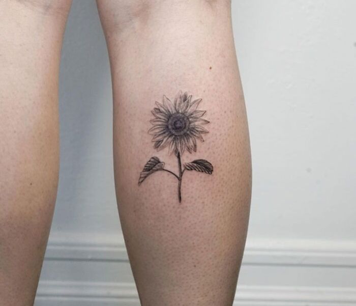 Sunflower calf tattoo