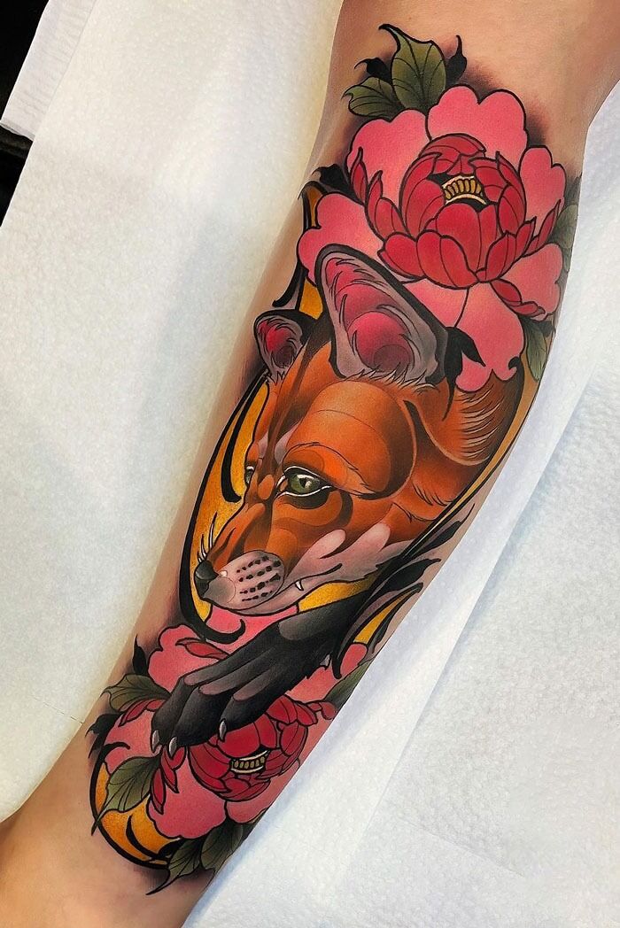 Watercolor fox tattoo on calf