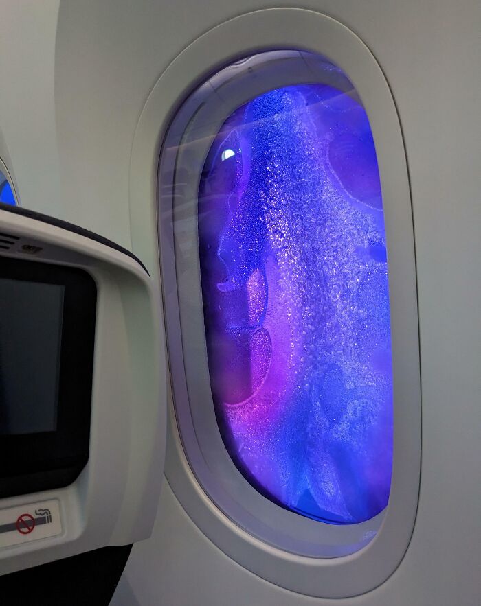 The Frozen Windows On My Plane Made It Look Like We Were Flying Through A Nebula