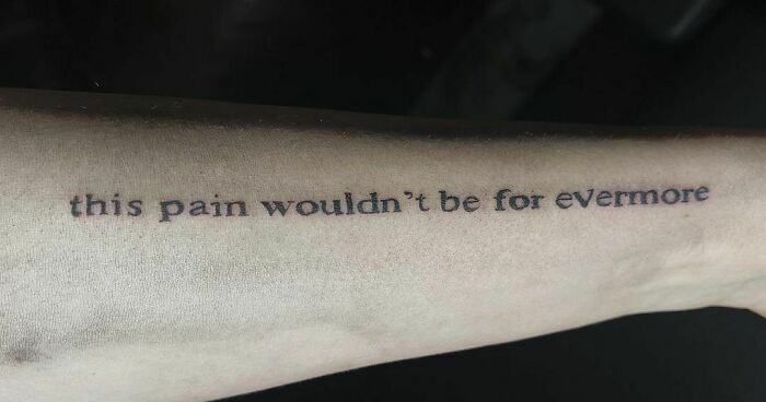 Self-love tattoo on an arm with the phrase "this pain wouldn't be for evermore" in black ink.