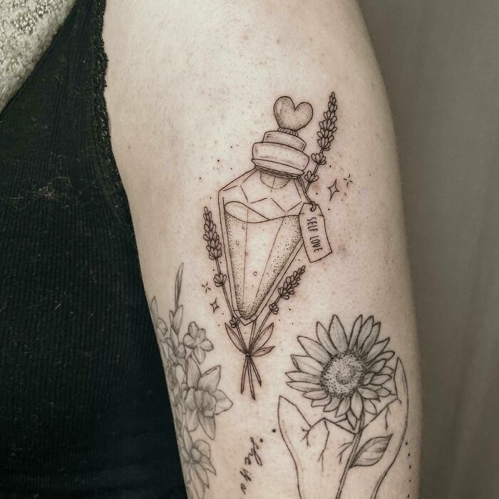 Self-Love Potion tattoo with flowers 