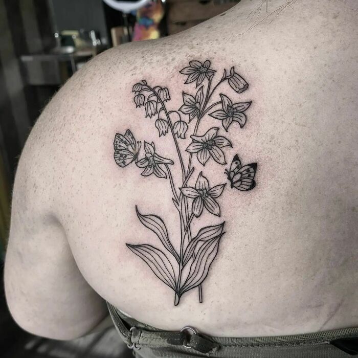 Flowers and butterflies tattoo