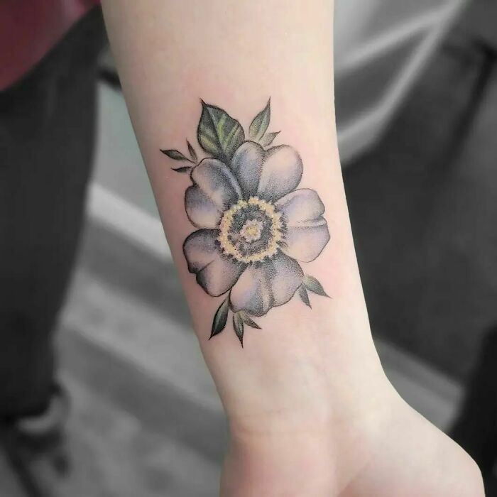 Watercolor flower blossom tattoo