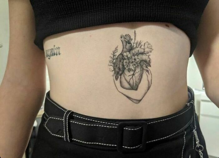 Heart with flowers stomach tattoo