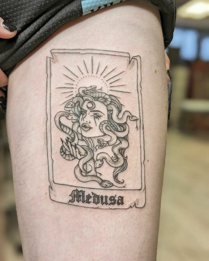 Medusa tarot card leg tattoo
