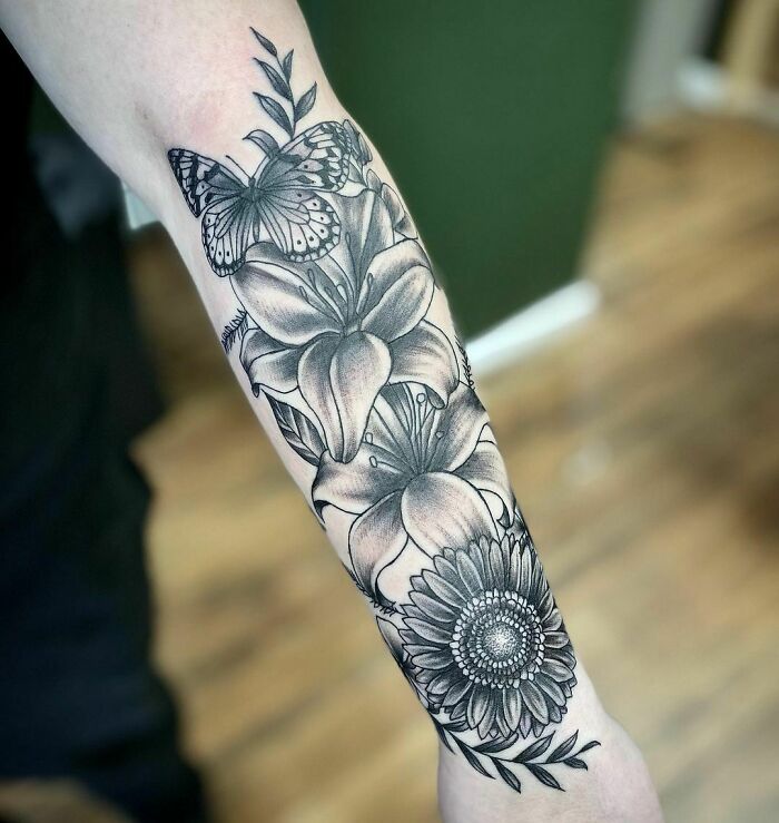 Flowers and butterfly tattoo
