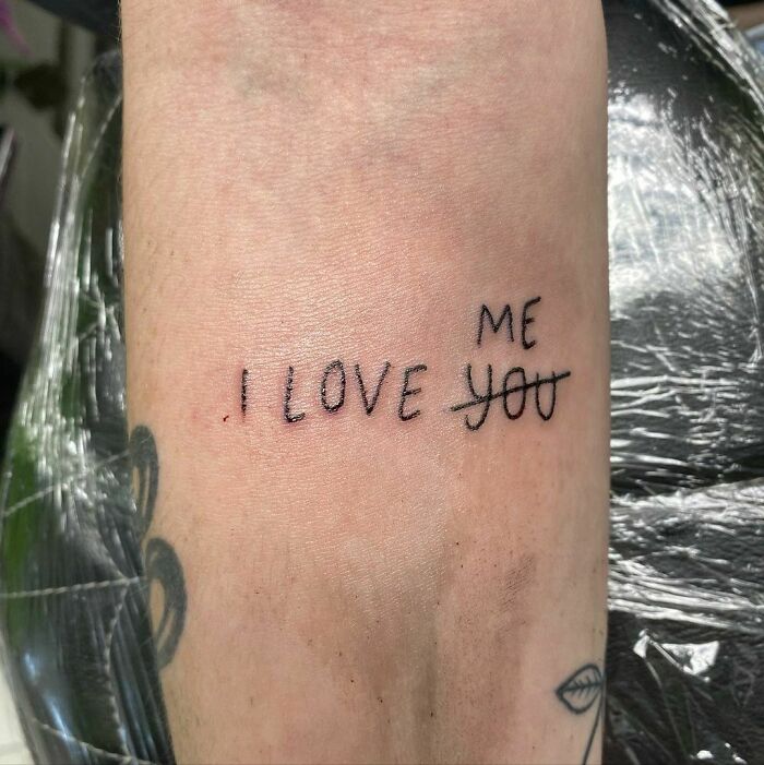 I love Me quote arm tattoo