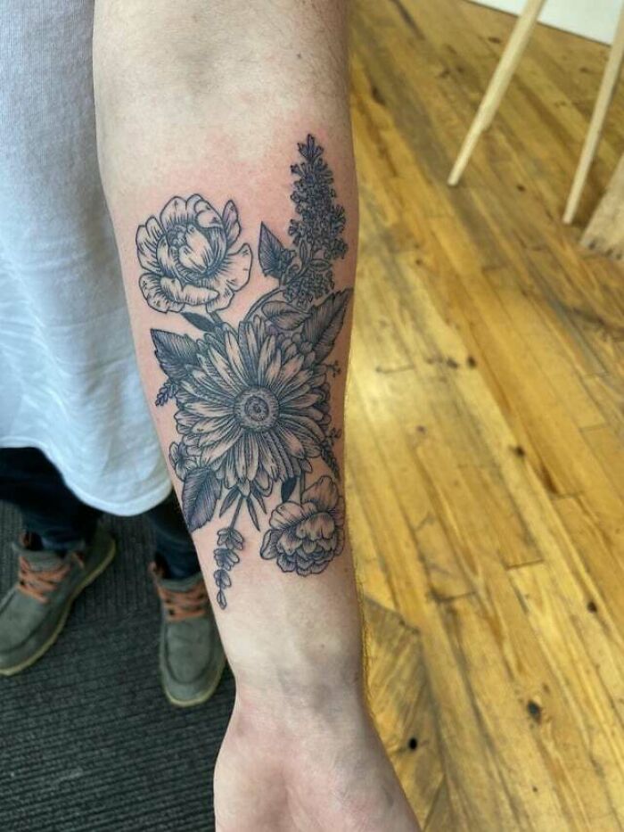 Flowers forearm tattoo
