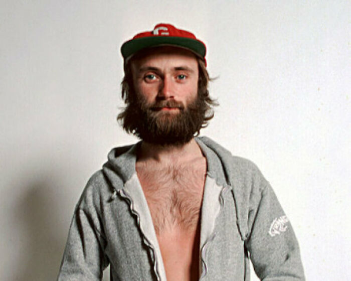 Phil Collins Doing A Photoshoot In 1976