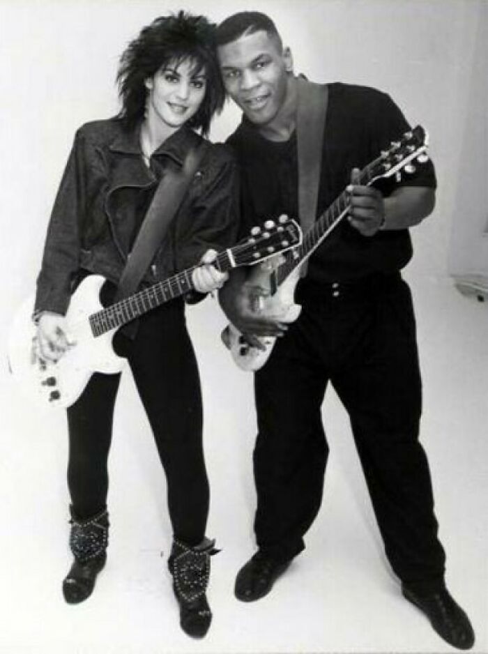 Joan Jett And Mike Tyson Posing With Guitars (In Fashion Magazine Photoshoot 1985)