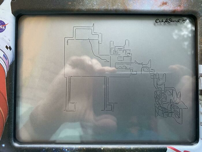 My Daughter Got An Etch A Sketch Today For Her 8th Birthday. She Drew A Cat Puking