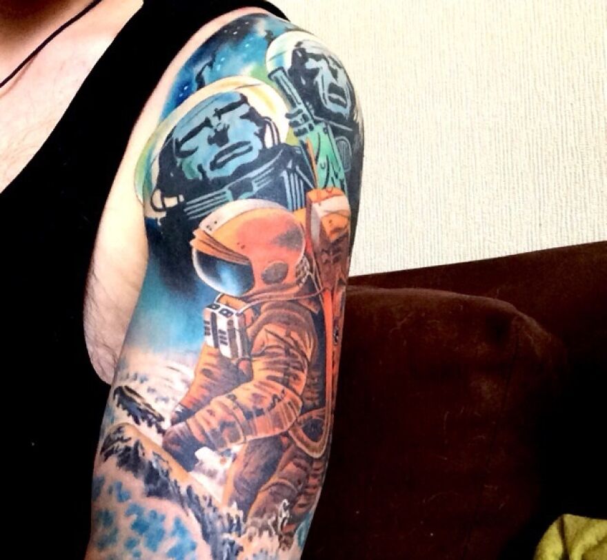 Retro space half sleeve tattoo on the arm