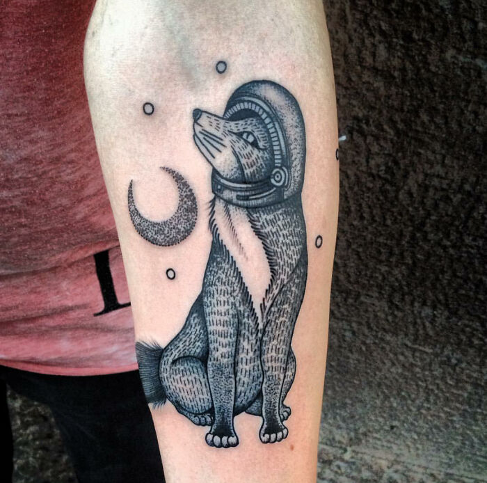 Space fox arm tattoo