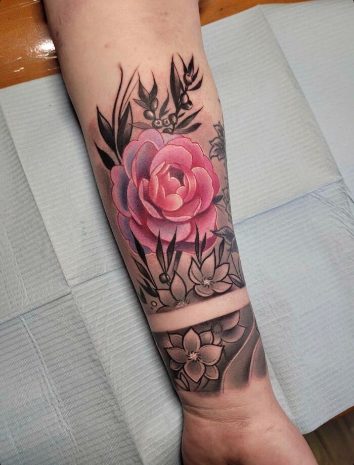 Watercolor pink rose hand tattoo