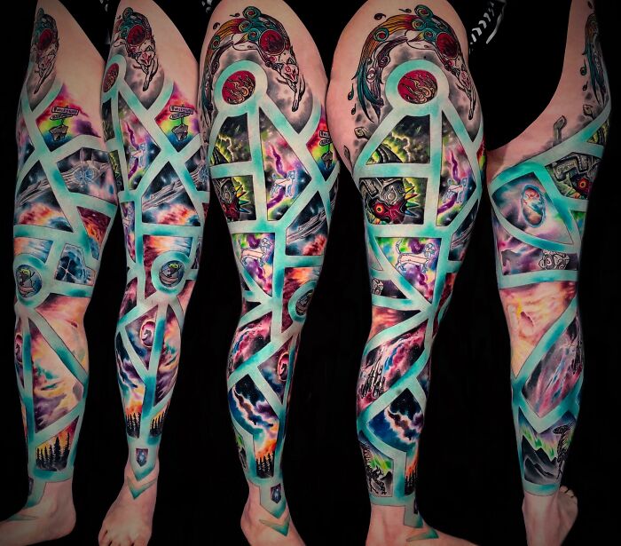 Space themed leg sleeve tattoo