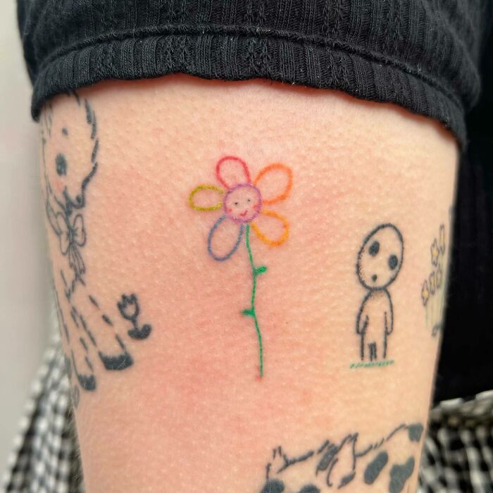 Rainbow colors flower tattoo