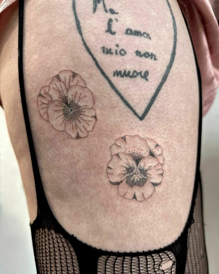 Flowers blossoms tattoo