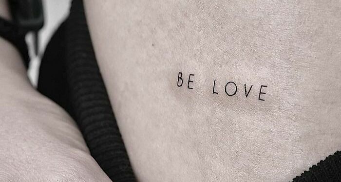 "Be Love" phrase tattoo 
