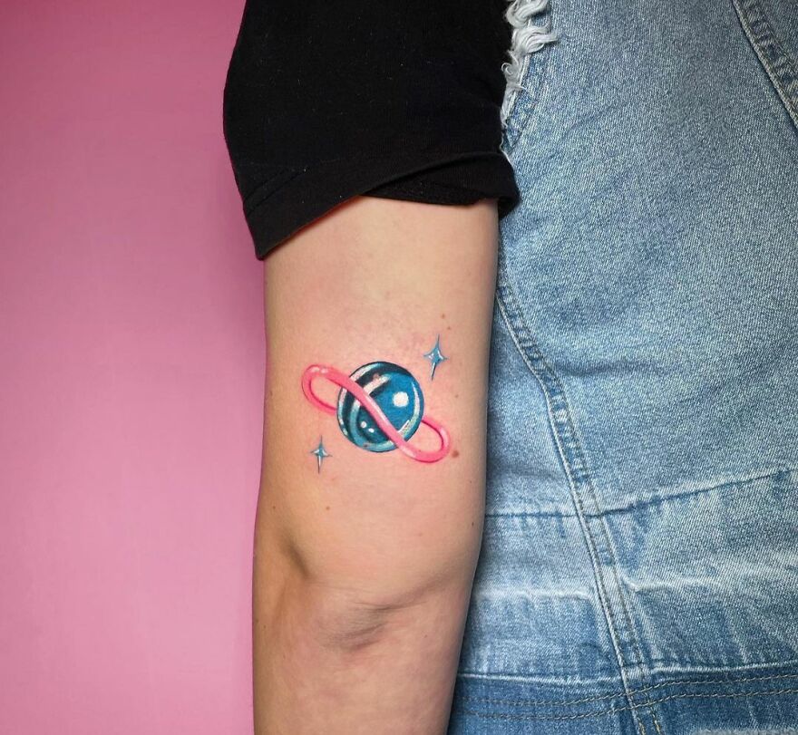 Bubbly Saturn arm tattoo