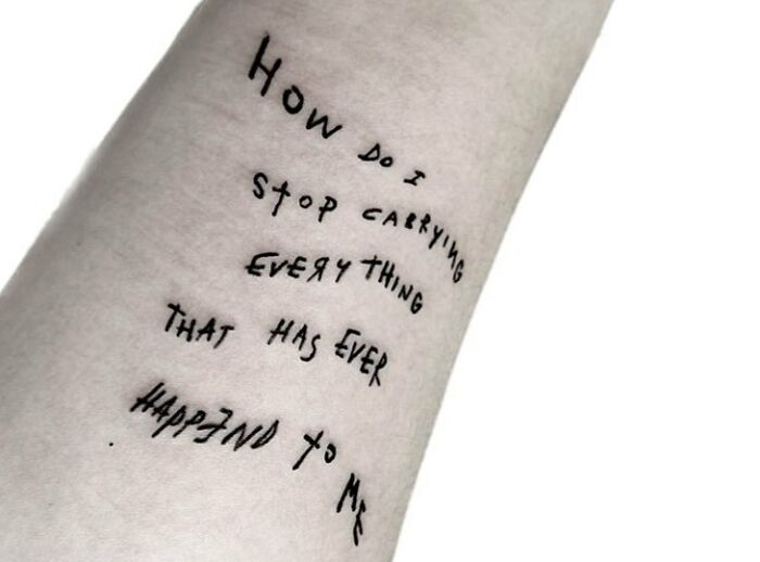 How do I stop carrying everything that has ever happened to me quote arm tattoo