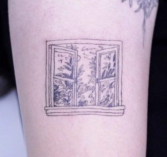 Opened window tattoo 