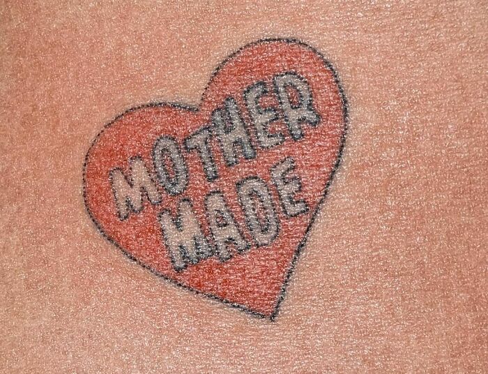 Heart-shaped tattoo with "Mother Made," highlighting self-love tattoo ideas.