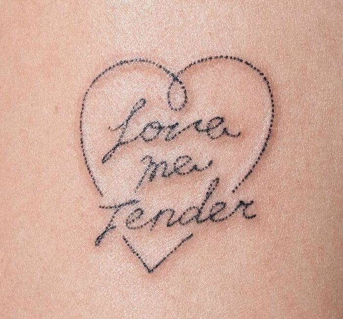 "Love Me Tender" in the heart tattoo 