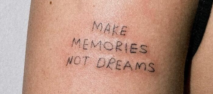 Make memories not dreams quote arm tattoo