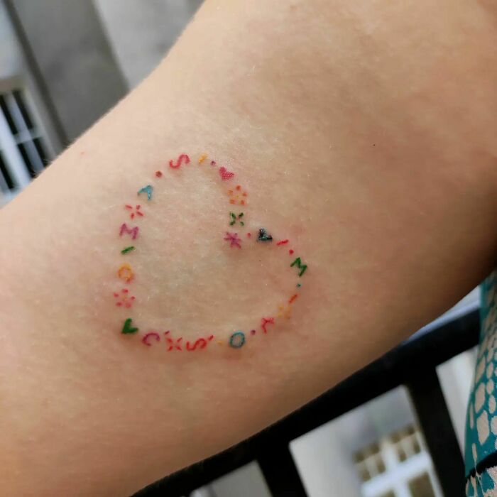 "Self-Love And Intimacy" in the heart shape tattoo 