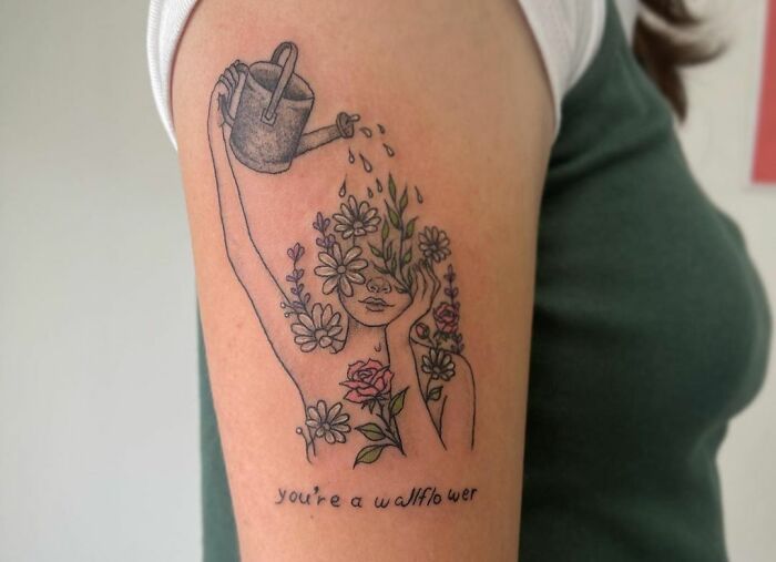 "You Are A Wallflower" woman watering flowers on the head tattoo 
