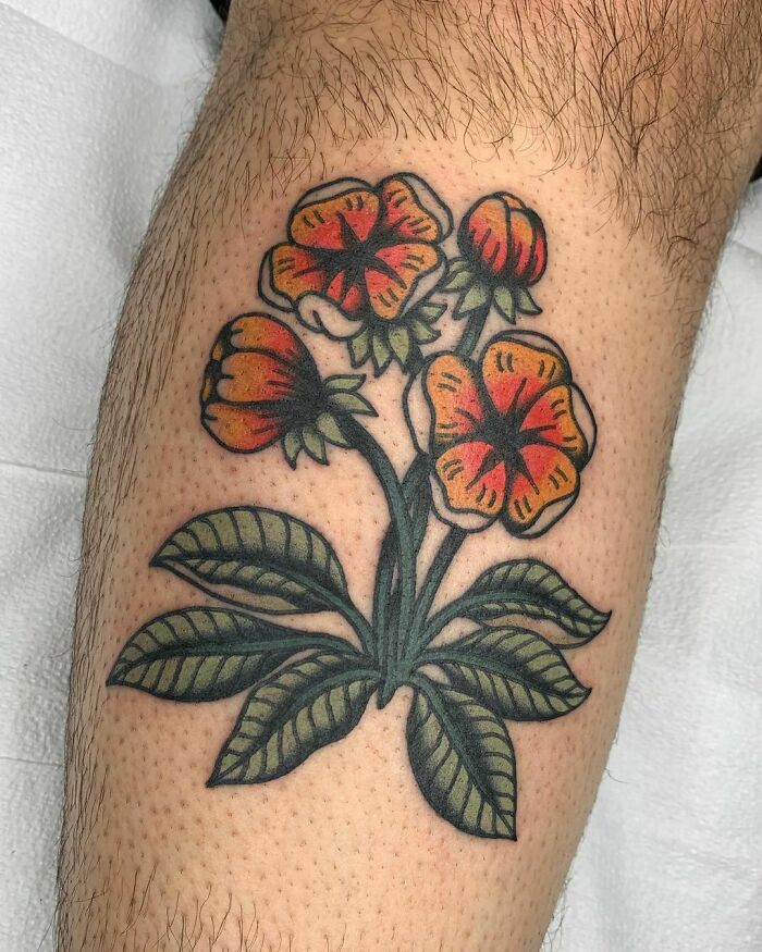 Orange flowers tattoo