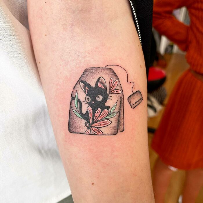 Flowers In Teabag With A Cat tattoo