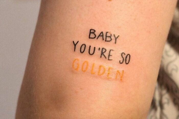 "Baby You're So Golden" phrase tattoo 