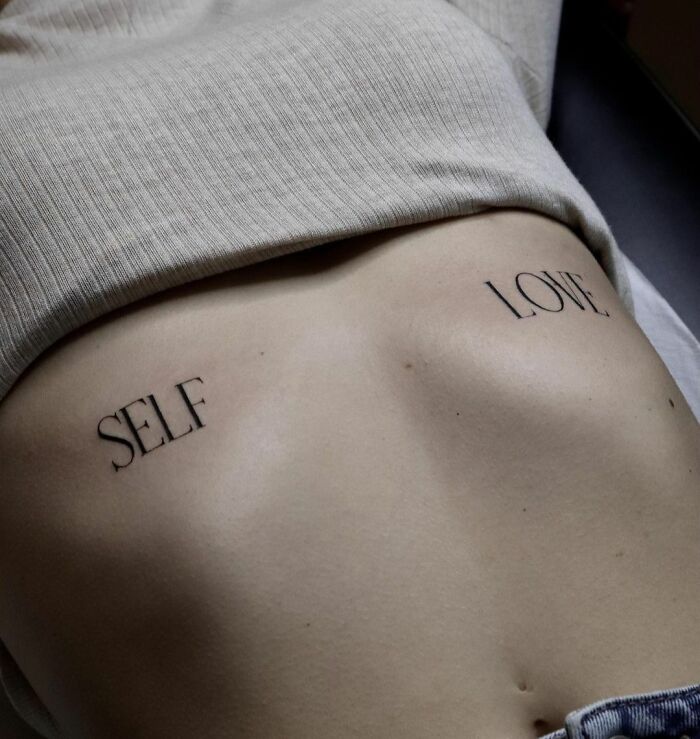 "Self love" ribs tattoo 