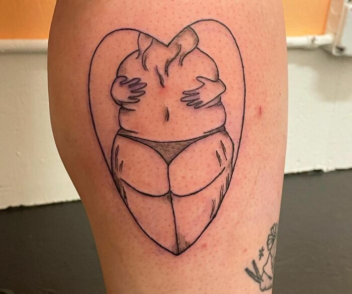 Self hug in the heart tattoo 